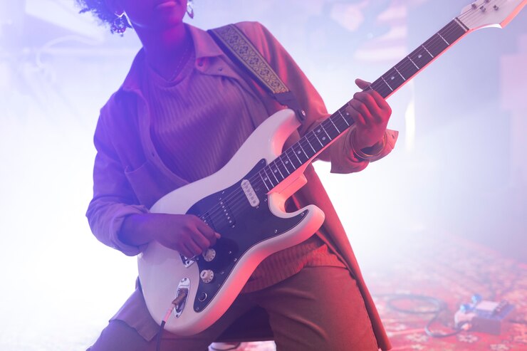 woman-playing-guitar-local-event_23-2149188125